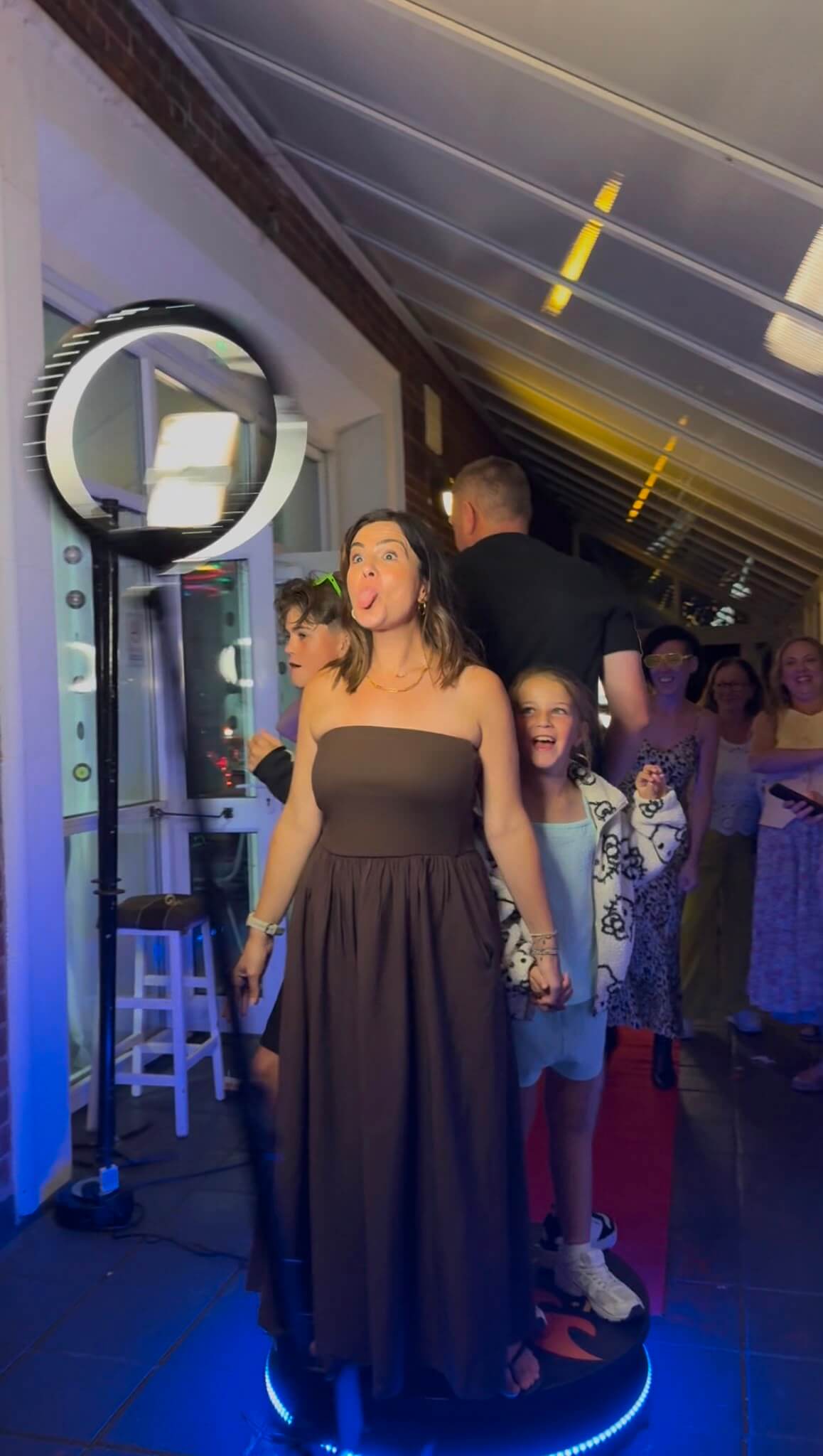 360 photo booth set up outdoors with props at a Coventry wedding